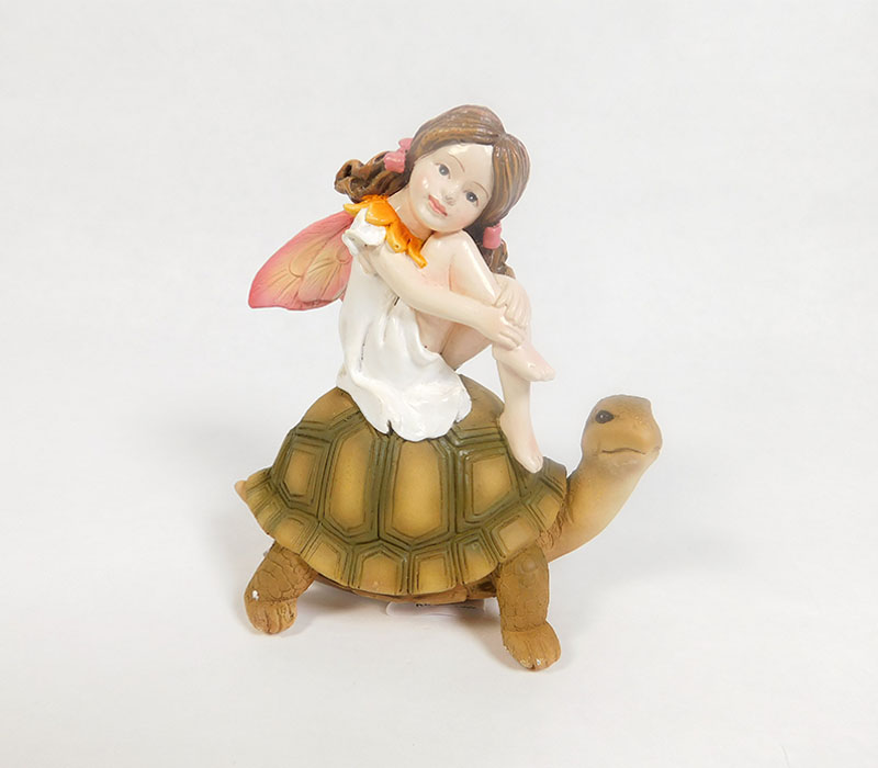 Fairy Sitting on Turtle