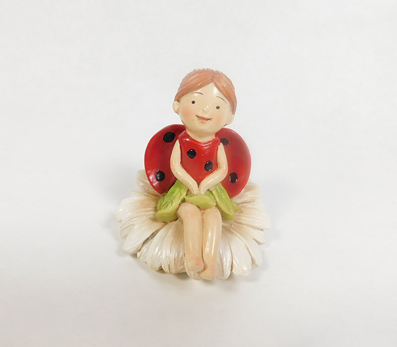 Fairy Sitting on Flower