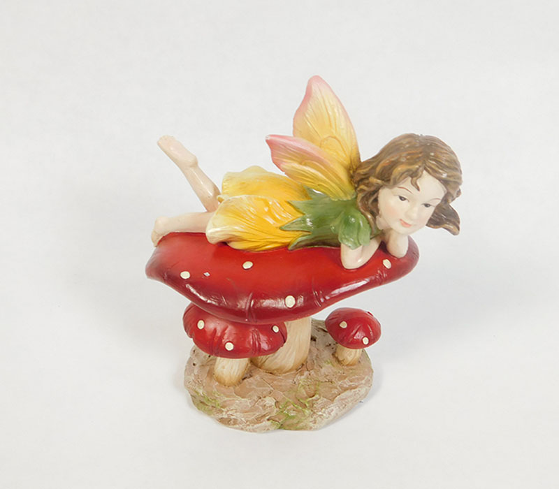 Fairy Lying on Mushroom