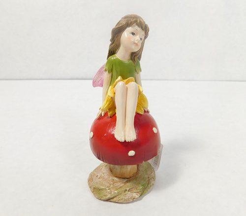 Fairy Sitting on Mushroom